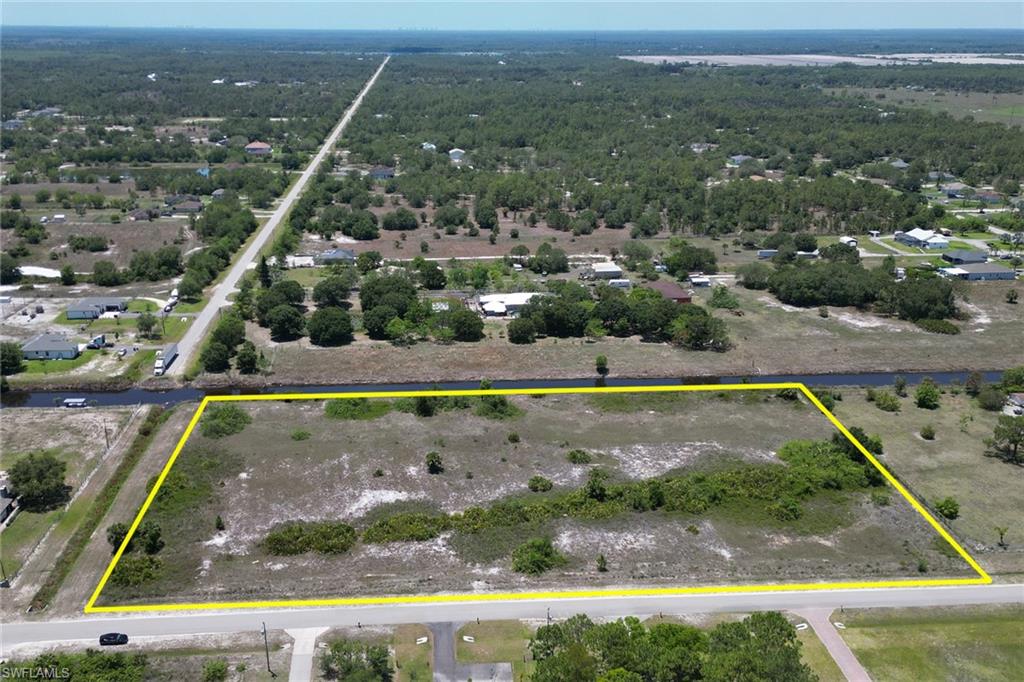 100% UPLAND - PRICED TO SELL :) ... Looking for a great opportunity to own land in a prime location? Look no further than this 5.83-acre lot for sale in Golden Gate Estate! This property is ideal for building your dream home or investing in a future development project.
The location of this property is one of its greatest features, as it is situated in a highly desirable area with easy access to major roads, shopping centers, and entertainment venues. The lot is also conveniently located near a canal, offering a great view and providing additional recreational opportunities.
This is the perfect opportunity for anyone looking to invest in real estate, whether you're an experienced developer or a first-time buyer. With its ideal location, size, and upland status, this lot won't last long on the market. So why wait?  start your journey toward owning your own piece of paradise!