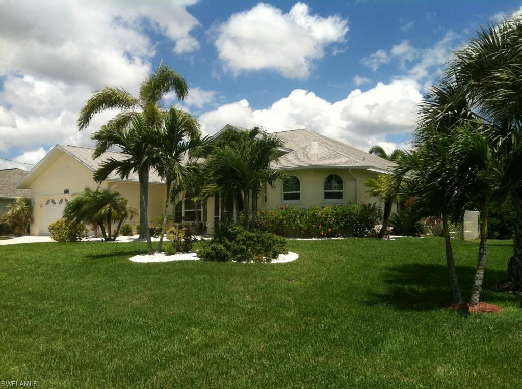 ELEGANT 3/2/2 pool home in a great SW location with an EXTRA half lot with fruit trees. Spacious kitchen with granite counter tops, tiled backsplash, center island and bar with stools. Open floor plan with high ceilings, formal dining area and den. Split bedrooms, two with new carpet, two walk-in custom closets in Master bedroom and bath with tub and separate shower. Walk thru the sliders to the large lanai and custom solar heated pool. ALL windows are double paned WIND RESISTANT with low e and  tinted. PLUS all lanai windows have electric shutters!
Plus there is a new 1600 SEER TRANE A/C unit and a never used new 6500 Watt Home Generator. ALL assessments are PAID.    Bring your discriminating buyers!