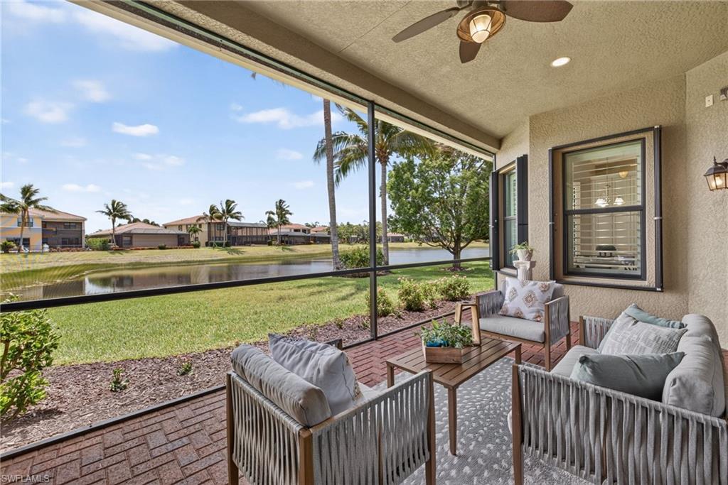 Sunrise in your private gated courtyard. Sunset over the lake from your lanai. Perfectly positioned to capture both, this beautifully maintained Carlyle model offers one of Riverstone's most popular settings with eastern front exposure, western rear exposure, and peaceful lake views that provide a stunning backdrop from morning through evening. With 3,064 square feet, 3 bedrooms plus a den, 3.5 baths, and a hard-to-find 3-car garage, the home balances elegant entertaining spaces with comfortable everyday living.

The open great room floor plan flows effortlessly into the formal dining area, while a wet bar with beverage refrigerator and custom wine storage creates the perfect gathering space for family and friends. The eat-in kitchen is thoughtfully designed with granite countertops and backsplash, a stainless steel vented cooktop hood, double wall ovens, abundant cabinetry, and a KitchenAid refrigerator (2022). Plantation shutters, custom his-and-hers closets, and numerous owner upgrades throughout reflect the exceptional care and attention given to the home. The versatile den offers an ideal space for a home office, media room, or flex space opening onto the front courtyard, while the spacious primary suite enjoys tranquil lake views from bay windows and a beautifully appointed bath.

Beyond its beautiful presentation, this home offers the kind of improvements buyers increasingly value but rarely find. A whole-house Generac generator (2019) powered by dual 120-gallon tanks, impact-resistant windows and doors, accordion shutters (2020) for convenient storm preparation, multiple surge protection systems, medical-grade UV air purification (2024), upgraded HVAC filtration, improved drainage around the property, and a garbage disposal (2025) provide exceptional peace of mind. A newer LG washer and dryer (2023) situated within the laundry room with a rinsing sink, folding counters and generous storage, and meticulous maintenance make this home truly move-in ready.

The expansive screened lanai showcases breathtaking sunset views over the lake, while the backyard offers ample room to create the custom pool and outdoor living space of your dreams. Located within Riverstone, one of North Naples' premier gated communities, residents enjoy resort-style amenities including a clubhouse, fitness center, resort and lap pools, tennis, pickleball, indoor and outdoor basketball courts, social activities, and top-rated schools, all just minutes from shopping, dining, and the Gulf beaches.

This is the complete Naples lifestyle package—beautiful views, thoughtful upgrades, exceptional peace-of-mind features, and a home designed for effortless Florida living.