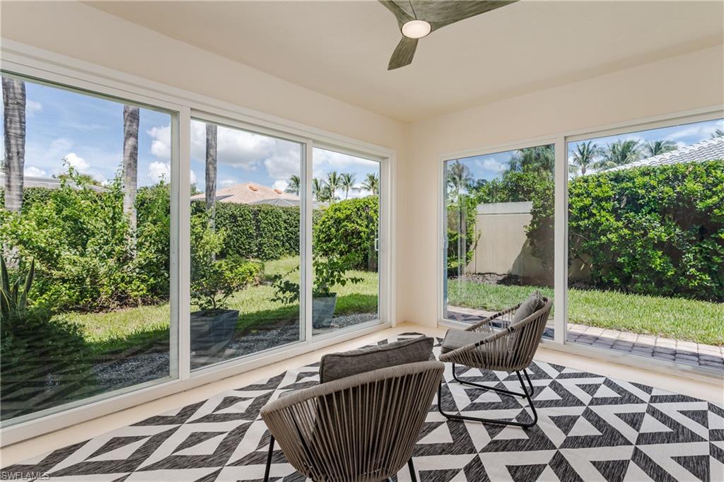 From the resort-style paradise of Island Walk, this spacious 2 bed, 2 bath attached villa is the ultimate opportunity to bask in the Naples lifestyle! Clean and pristine, this well-maintained villa includes a newer A/C unit, new water heater, impact windows surrounding the lanai (plus hurricane shutters throughout), 2022 garage door, double car garage, a private and meticulously landscaped back yard, and an extra "den" adding to the spacious layout! The villa is located nearby the Logan exit for convenient transportation, and is a few streets down from the famous Island Walk clubhouse! Featuring low HOA fees, Island Walk residents receive full access to ample amenities unrivaled by any other Naples community: Gas station, hair salon, post office, fine dining, large gym (which overlooks the community lake!), resort style pool and clubhouse, tennis, pickleball, shuffleboard, putting green, lap pool, and on-site property management. Additionally, all of Island Walk’s canals lead to the main clubhouse lake, perfect for kayaking and fishing! The bridges connecting throughout are also great for jogging, biking, meeting friendly neighbors, enjoying the tropical landscaping, and soaking up Naples’ trademark sunshine! Outside Island Walk, there are numerous shopping opportunities nearby, you are close to I-75 access, AND just a 15 minute drive from world famous Naples beaches, featuring miles of white sugar sand, calm blue waters, and picturesque sunsets. This is a tremendous opportunity to own a great slice of one of the most beautiful corners of the country - Naples, Florida!