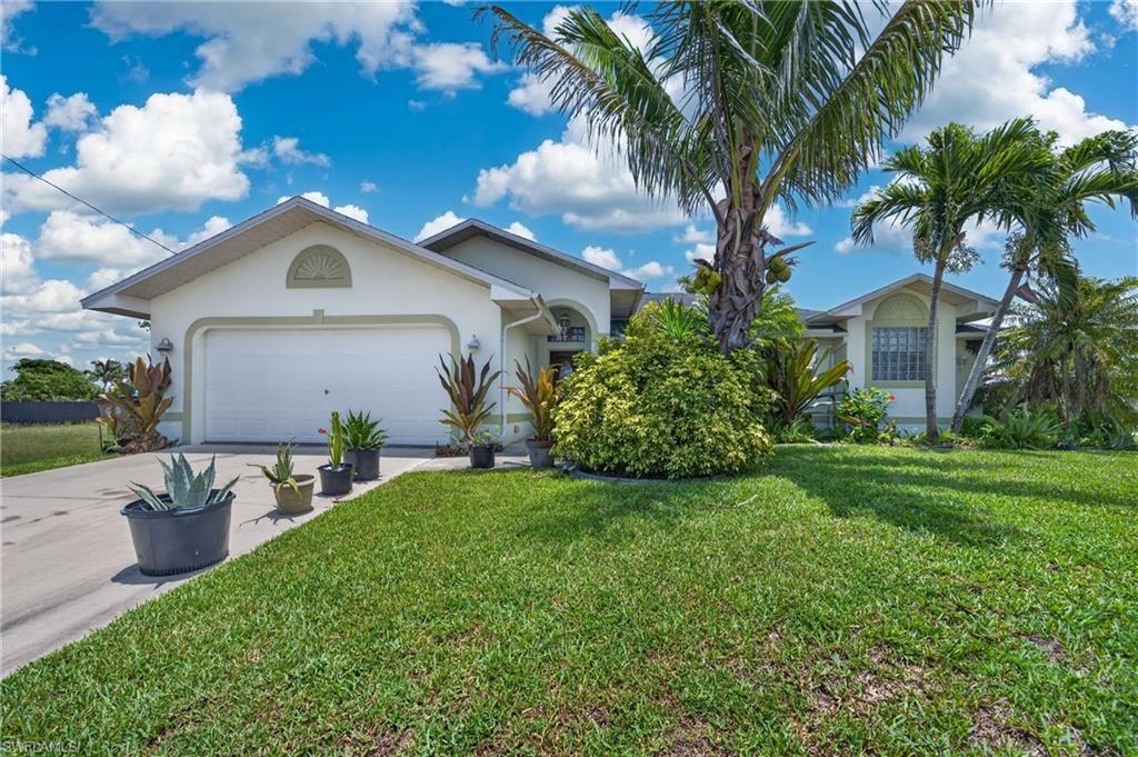 Well-maintained and spacious home offering over 1,800 sq. ft. of air-conditioned living space in a convenient NE Cape Coral location. This 3-bedroom, 2-bath residence features a desirable split-bedroom floor plan with soaring cathedral ceilings that create an open and airy feel throughout the home.

The large living areas flow seamlessly into the oversized screened lanai, perfect for relaxing or entertaining year-round while enjoying the Florida lifestyle. The spacious primary suite offers walk-in closets and plenty of privacy from the guest bedrooms.

Major updates provide peace of mind, including a 2 year old roof, newer A/C system, water heater, and updated water equipment. The kitchen is equipped with new appliances including a refrigerator and dishwasher, making this home move-in ready.

Whether you are searching for a full-time residence, seasonal getaway, or investment opportunity, this home offers exceptional value with generous square footage, modern updates, and a functional layout in one of Cape Coral’s fastest-growing areas