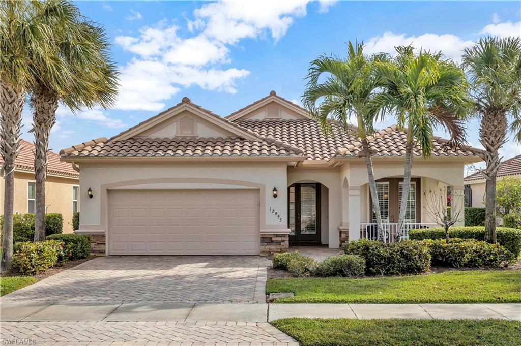 GOLFERS DREAM HOME overlooking the 11th tee box with stunning lake view.  This Mackenzie I floor plan offers 3 Bedrooms, 2 Bathrooms and a 2 Car Garage. The eat-in Kitchen has granite countertops, upgraded Cherry Cabinets, Stainless Steel Appliances & tumbled stone backsplash. The master-suite has door to lanai, large walk-in closet, master bath with separate shower and tub, dual sinks, and expansive counter space. There are roll down hurricane shutters on the front doors and rear lanai. Additional upgrades include plantation shutters, overhead garage storage & NEW A/C (2015). Laundry room includes washer/dryer & utility sink. SOMERSET AT THE PLANTATION GOLF & COUNTRY CLUB is a gated community that features Clubhouse, restaurant, resort style pool/spa, social clubs, Hudzan-Fry championship 18-hole golf course, 6 tennis courts, 2 pickle-ball courts, billiards & fitness center. Golf memberships available but not required. Great location near I-75, shopping, restaurants, airport & beaches.