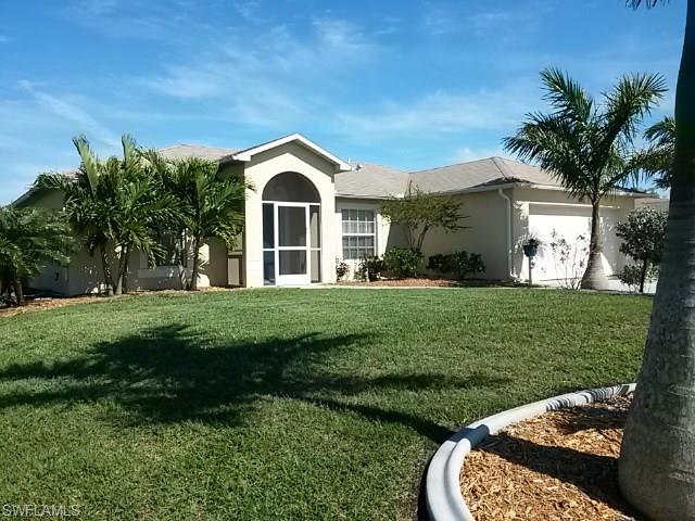 Your own private oasis just steps away from the back door, is where you will be spending your weekends.  This maturely landscaped 3/2/2 is located in one of the most desirable areas of NW Cape Coral.  Enjoy a short drive to local offered amenities such as, multiple public parks, saltwater boat ramps,  shopping, and much more.  This home offers many attractive features such as mature landscaping with curbing, a private 6' wood fence, a large open kitchen with wood cabinets and a bay window breakfast area to overlook the amazing backyard.   Laminate flooring has been installed throughout the main living areas of the home, tile in the wet areas, and carpet in the bedrooms, which was replaced less than one year ago. Make this house your home by calling us today to set up your private showing.