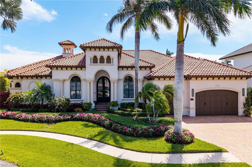 An extraordinary custom-built waterfront estate, masterfully designed to embody the pinnacle of coastal luxury living. This 3-bedroom, 3.5-bathroom residence showcases soaring ceilings and striking zero-corner sliding glass doors, creating a seamless indoor-outdoor experience while framing uninterrupted panoramic water views.
Perfectly positioned on a coveted key lot with direct Gulf access, this property offers the ultimate boating lifestyle, featuring a private wood dock and boat lift just moments from open water.
Each generously appointed bedroom is a private retreat, complete with its own spa-inspired ensuite bath. The home is further enhanced by bespoke finishes throughout, including custom closets, designer window treatments, elegant bullnose detailing, and refined baseboards.
The expansive lanai is a true showpiece, highlighted by a stunning custom teak ceiling, a fully equipped outdoor kitchen, and a statement fireplace, making an ideal setting for sophisticated entertaining or serene sunset evenings.
Additional premium features include a whole-house generator, climate-controlled mini-split system, and an immaculate 3-car garage with epoxy flooring.
This is a rare opportunity to own a meticulously crafted waterfront sanctuary where luxury, comfort, and timeless design converge.
