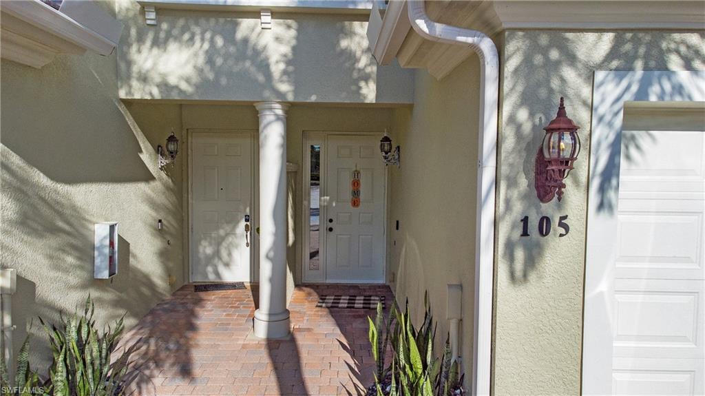 Beautifully decorated 2,334 sq ft 3 bedroom/2.5 bath townhome.  Brand new roof and A/C just installed.  Fresh paint, crown molding and new LVP flooring on the second level.  This is the largest and lowest price per sq ft. listed in Mariposa.  This home boasts a formal dining area, screened lanai, spacious kitchen, and LOFT! Large kitchen has tons of storage and counter space along with breakfast bar and informal dining area. It opens to the large living room and lanai. The upstairs loft adds a cozy feel and leads to each bedroom. Master suite has two closets (one large walk-in, one standard), large bathroom with separate tub and shower, all new fixtures and toilet closet. Both guest bedrooms can accommodate king size beds. The shared bathroom has two sinks and lots of counter space. Laundry room is conveniently located upstairs. Attached two car garage. Mariposa Community amenities include pool, community room, and exercise room. Location can't be beat - close to the beach, dining, shopping, activities, and I-75. **Highly desired Osceola Elementary/Pine Ridge Middle/Barron Collier High school zone!!**