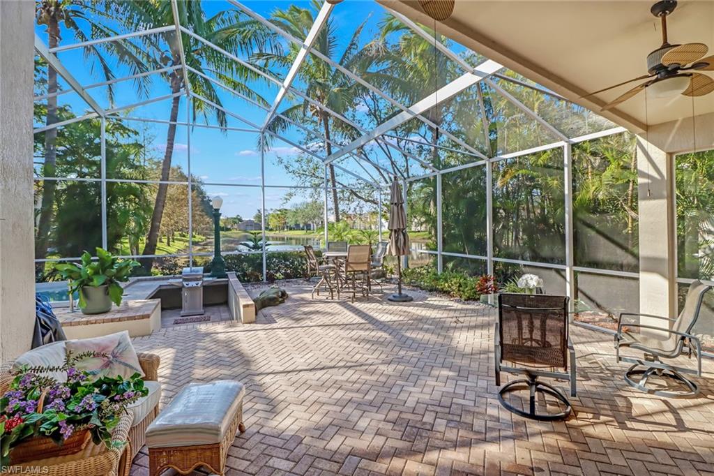 Enjoy incredible sunsets from this spectacular waterfront home offering deep lake views from its premier homesite. From the moment you enter this home, you'll be drawn to the oversized outdoor lanai featuring covered and uncovered living space equipped with a sunken barbecue pit and in-ground spa.  Inside the home is just as impressive. As you enter through the double front door entry, you will appreciate every detail of the house, including tile floors throughout the main living and den, accordion hurricane shutters, central vac, and upgraded window treatments, including plantation shutters and Hunter Douglas vertiglides. In addition, the home has tons of storage space in the upgraded laundry area and kitchen. Other notable upgrades are the replaced HVAC System (2018), Water Heater (2018), and BRAND NEW ROOF IN 2021! This home also features a 4-foot garage extension. The amenity center just underwent a complete renovation. Spearheaded by a full-time activities director you'll find an indoor/outdoor swimming pool, renovated fitness center with all-new equipment, billiards rooms, multiple card rooms, a craft room, a thriving pickleball, and tennis program, and more!