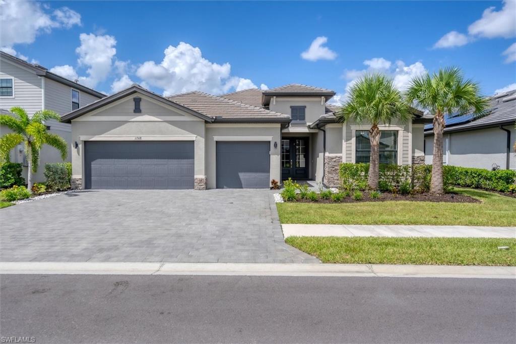 Welcome to Timber Creek where "Your home is your Oasis". Timber Creek offers a luxurious lifestyle that exemplifies modern comfort and elegance. This stunning residence showcases Lennar's highly sought after Summerville model, renowned for its spacious design and premium features. Boasting a generous 3-car garage. 3 bedrooms + Den and 3 bathrooms. The Summerville model provides unparalleled privacy and ample outdoor space for relaxation and entertainment. With upgraded plank tile as you enter through the double doors into front foyer you will find a seamless flow from room to room. The living room and owner's suite are fitted with elegant tray ceilings, enhancing the overall ambiance with a touch of sophistication. There is no shortage of counter space or storage in your spacious kitchen. Kitchen was designed for the ideal cooking enthusiast or those who love hosting gatherings, while seamlessly integrating with the open floor plan that connects the living, dining, and kitchen areas effortlessly. This home is equipped with state of the art solar panels greatly reducing cost of electricity during those warm summer days. Timber Creek community amenities include exclusive access to resort-style pools, fitness centers, and recreational facilities, ensuring a lifestyle of convenience and leisure right at your doorstep.This home represents a rare opportunity to experience luxury living at its finest in the heart of Timber Creek. Schedule your tour today and envision the endless possibilities awaiting you in this remarkable home.