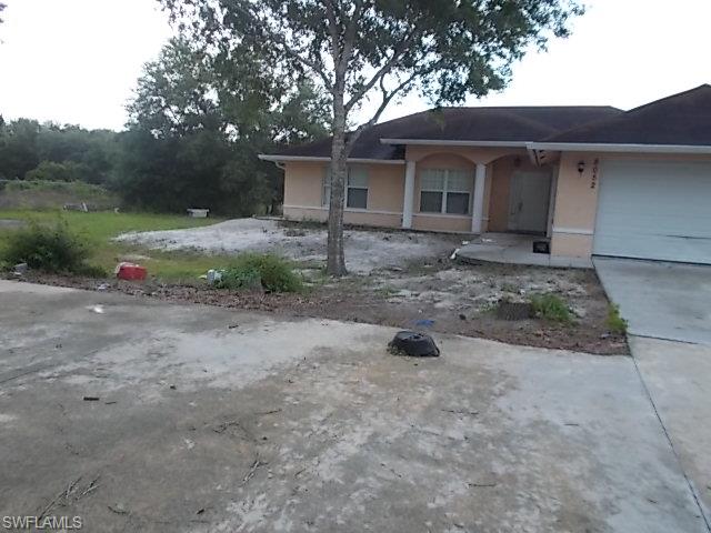 This 4 bedroom 2 bath 2 car garage home is located on just over 1 1/4 acre in Montura Ranches. Master suite is large and master bath has dual sinks with a tub/shower combo. Spacious 2, 3 and 4th bedrooms. Large kitchen with breakfast bar. Open lanai for all entertaining needs.