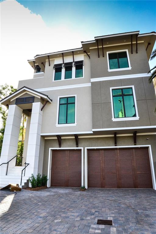 Construction is now complete on this direct Gulf front residence. The main living level includes two private guest suites w/ full baths, guest laundry, custom bar w/ seating, and a stunning gourmet kitchen that includes a gas range, breakfast bar & butler's pantry. The great room offers intricate ceiling detail & pocketing sliders to allow for panoramic Gulf views. An elevated pool & spa can be found off of the main living level with glass railings to maximize Gulf views, outdoor kitchen, and convenient pool bath. The 3rd floor features the master bedroom, bonus/entertaining room, study/home office & full bath. The master bedroom includes a private lanai, fireplace and a spacious bathroom w/ automated toilet, walk-in shower w/ seamless glass door & multiple shower heads. The bonus room features custom bar, gorgeous wood lined ceilings, & lanai overlooking the Gulf of Mexico.  Six car plus garage.  A stunning beach home!