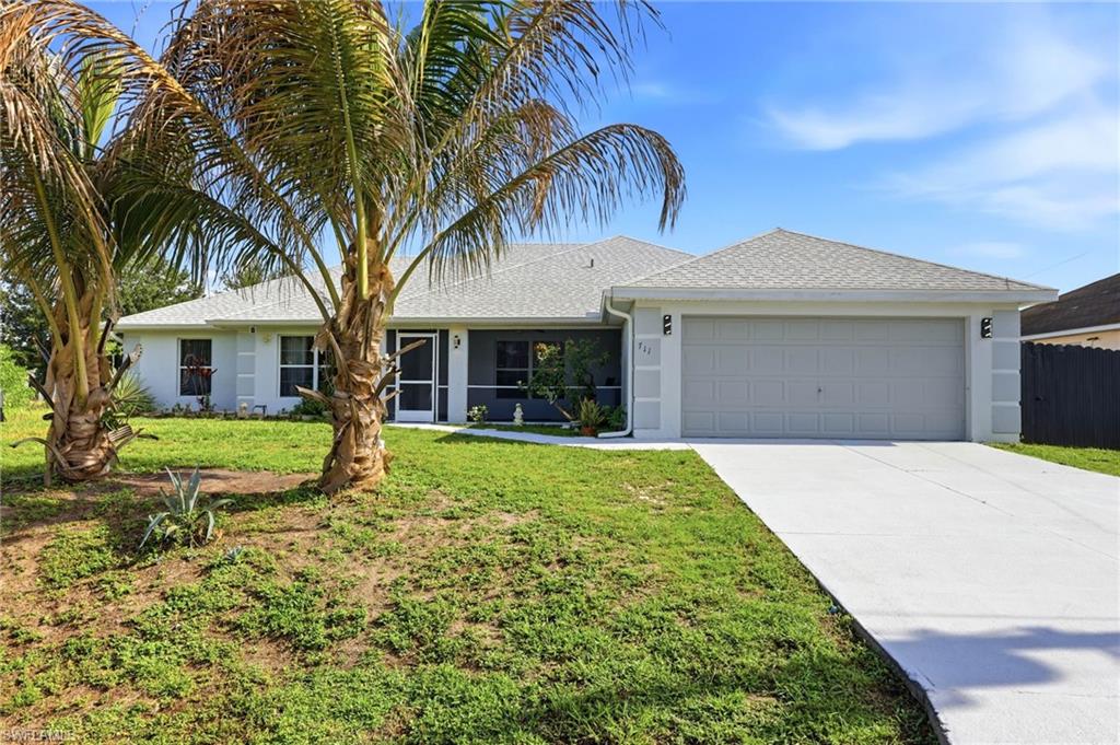 Welcome to this impressive home nestled in the peaceful surroundings of Lehigh Acres — where space, comfort, and Florida outdoor living come together. With 2,240 square feet of thoughtfully designed living space, this 4-bedroom, 2-bath residence offers room for every lifestyle.

The open floor plan flows effortlessly from the spacious great room into a large eat-in kitchen that is sure to impress. The kitchen features gorgeous granite countertops, stainless steel appliances, a center island with breakfast bar seating, and a bright sunny breakfast nook, making it the perfect hub for both everyday living and entertaining. Tile and laminate flooring run throughout the home for a cohesive, low-maintenance look.

A formal dining and living room, easily used as a den or home office, adds welcomed flexibility, while a generously sized laundry room keeps daily routines running smoothly. The oversized primary suite is a true retreat, complete with a private en-suite bath. Three additional large bedrooms offer ample space for family, guests, or a dedicated workspace.

Step outside to your own private oasis — a beautiful in-ground pool, covered patio for year-round enjoyment, a fully fenced yard for privacy and peace of mind, plus a handy storage shed. The 2-car garage and generous driveway ensure plenty of parking for everyone.

This is Florida living at its finest — a big, beautiful home with the space and finishes you've been looking for.