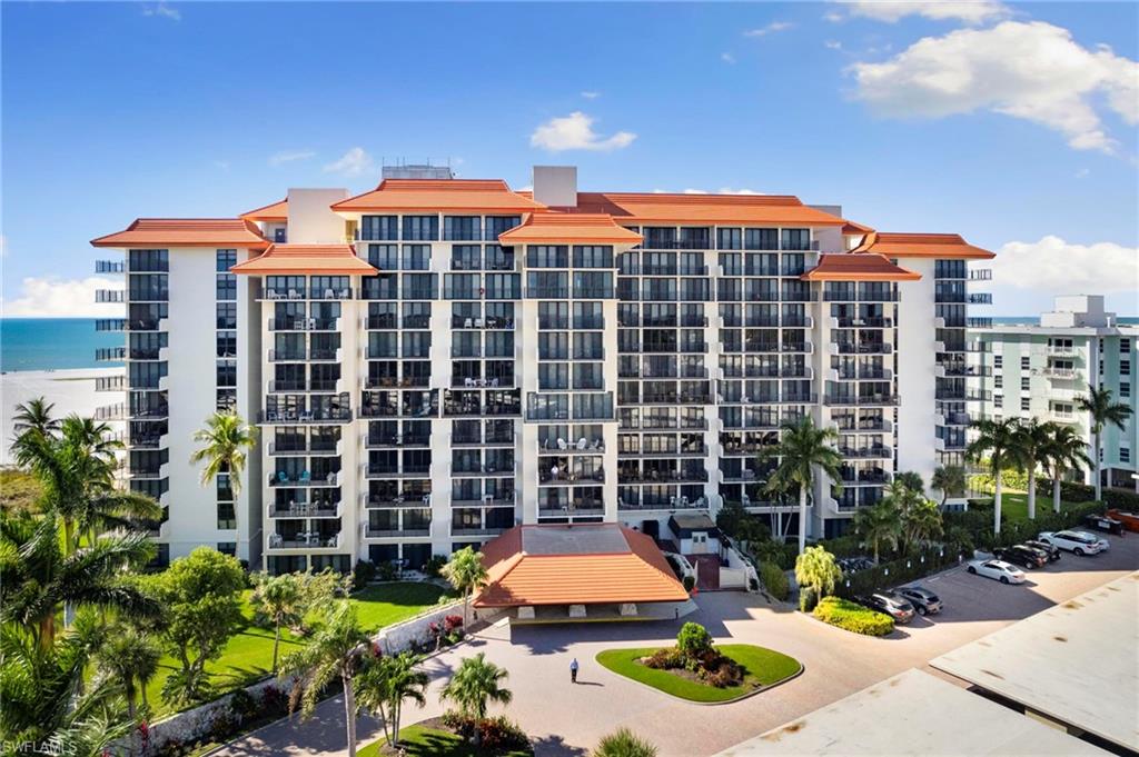Wake up to the soothing sound of the Gulf and embrace the effortless beachfront lifestyle you’ve been dreaming of in this beautifully updated 2-bedroom, 2-bath condominium in the highly desirable Tradewinds community on Marco Island, Florida. Offering 864 square feet of thoughtfully designed living space and coveted western exposure, this beachfront retreat showcases breathtaking Gulf views and unforgettable sunsets from your private open balcony—the perfect setting for morning coffee, evening cocktails, or simply taking in the beauty of the coast.

Inside, coastal-inspired finishes create a bright, welcoming atmosphere designed for easy island living. The updated kitchen features quartz countertops, stainless steel appliances, generous cabinetry, and an open flow into the living and dining areas. Coastal plank tile flooring extends throughout the residence, while hurricane impact windows provide comfort, energy efficiency, and peace of mind.

Life at Tradewinds is all about enjoying the best of Marco Island. Spend your days soaking up the sun on the sugar-sand beach, lounging by the beachfront pool, gathering with friends at the tiki hut, or unwinding in the clubhouse and library. Additional conveniences include an assigned covered carport and private storage, offering plenty of room for bicycles, beach chairs, paddleboards, and all your island essentials.

Perfect as a primary residence, seasonal getaway, vacation home, or investment property, this Gulf-front condo places you just minutes from Marco Island’s celebrated waterfront dining, boutique shopping, marinas, golf, boating, fishing, and endless outdoor recreation. Experience the ultimate Southwest Florida waterfront lifestyle, where every day begins with the beach at your doorstep and ends with spectacular sunsets over the Gulf.