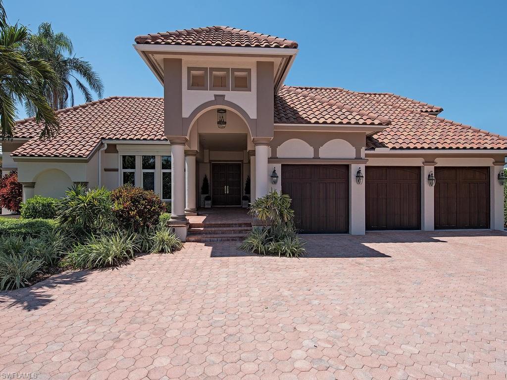 H.12953  Significant price adjustment!  This is an ideal buyer opportunity to own a Port Royal Club membership-eligible home in walking distance to the beach.  Located across the street from the Port Royal Club’s beach, tennis and fitness centers, this island-style courtyard home is the perfect marriage of privacy, convenience and comfort. Encircling an enchanting, tropical-landscaped courtyard with an updated pool and spa, the spacious great-room floor plan allows for abundant, natural light thanks to its numerous glass doors which provide access to a private, luxurious, outdoor lifestyle. Featuring two master bedroom suites and three additional guest room suites, the house also features a two-sided glass fireplace which you can view from both the private study and the formal living room. The 12-foot coffered and vaulted-beam ceilings offer an open and airy sense of space, highlighted by white oak flooring throughout the common areas. The kitchen has full, gourmet amenities including a gas range. Owners have made many improvements, and you are now invited to create some of your own. The possibilities are endless!
