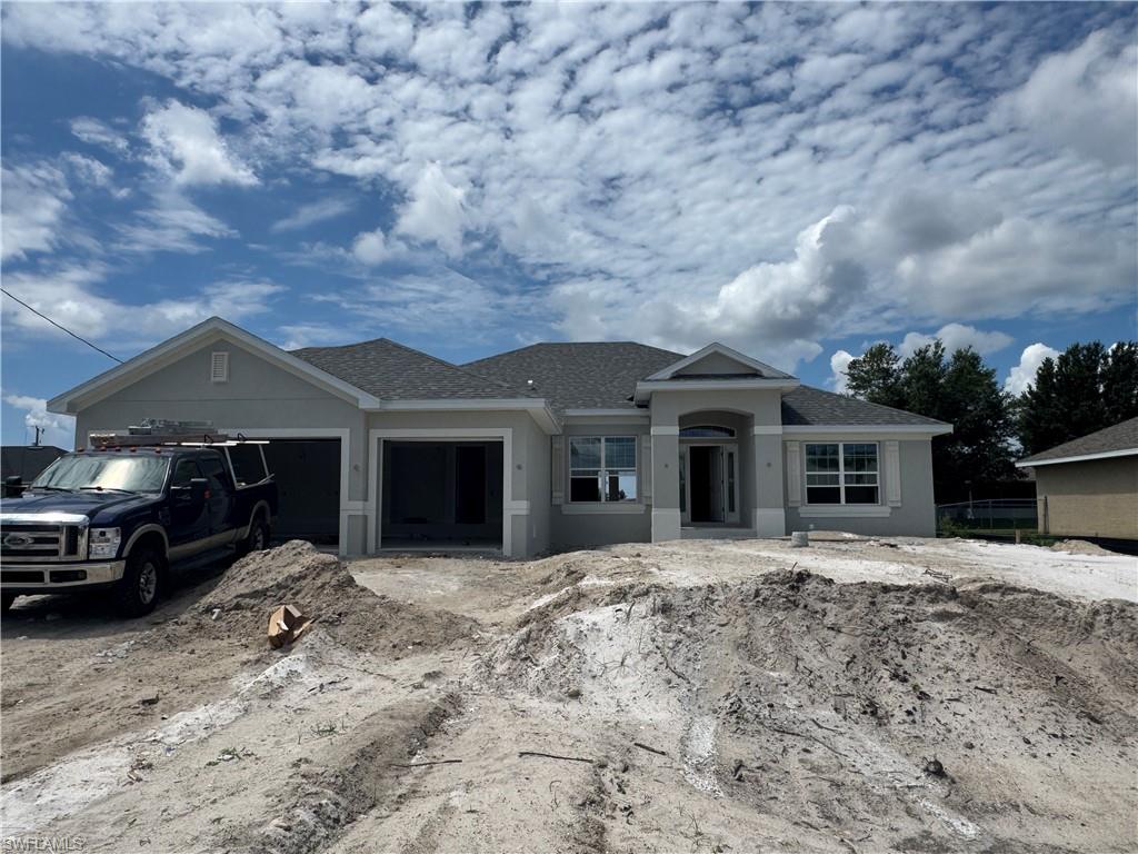 ASK ABOUT INCENTIVES! NEW CONSTRUCTION = NEW ELEVATION + NEW WIND LOAD BUILD CODES + BUILDER WARRANTY!  Here is our Top Selling Floor Plan -This is the Perfect 4 bedroom, 3 bathroom, 3 car garage ranch with 2265 sq ft of highly functional space on a gorgeous Canal Lot in the Heart of Cape Coral. Stone accenting with the "Craftsman" elevation + Covered Front Porch, Plank Tile & Granite Throughout, Large 23' x 8' covered lanai, - Copious Natural Lighting - Parade of Homes winner for best feature "Integrated Family Living Space" *MLS Listing Data Subject to Errors & Omissions**Price & Availability Subject to Change*
