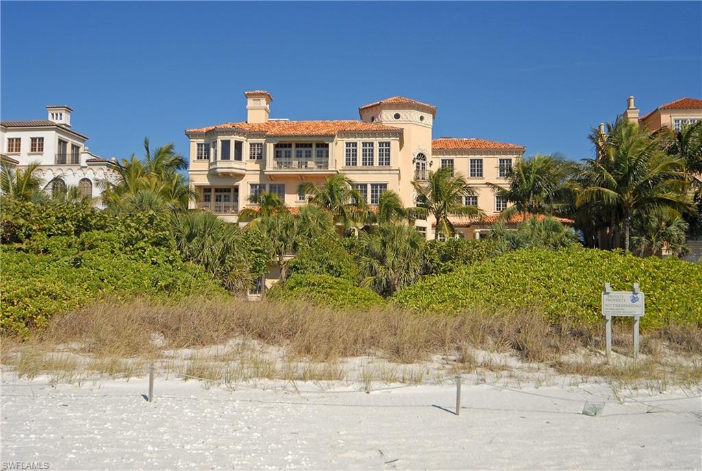 H.1559 - This extraordinary beachfront estate embodies all the luxurious qualities that one would expect to find in a home of this magnitude plus much more. Offering 129’ of beach frontage this 10,345 S/F residence was renovated with such enhancements as a state-of-the art Clive Christian kitchen and luxuriously updated sumptuous Master Suite with sweeping views to the south, fireplace plus office/sitting room. Designed by David Humphries and built by Kurtz Homes in 2002, this estate is finished with a warm understated elegance and quality expressed in light marble and mahogany floors, coffered ceilings and maple millwork detailing throughout. Other highlights include living room with hand carved Mexican limestone fireplace, two story formal dining room, summer kitchen and beach side pool. Additional features include a 4,000 bottle wine room, home theater with Crestron system, library with two-story beamed maple ceiling and fireplace. Set against a dramatic Gulf of Mexico scene that permeates the entire house, this masterfully crafted residence is undoubtedly one of the “Crown Jewels” on the coast of Naples.