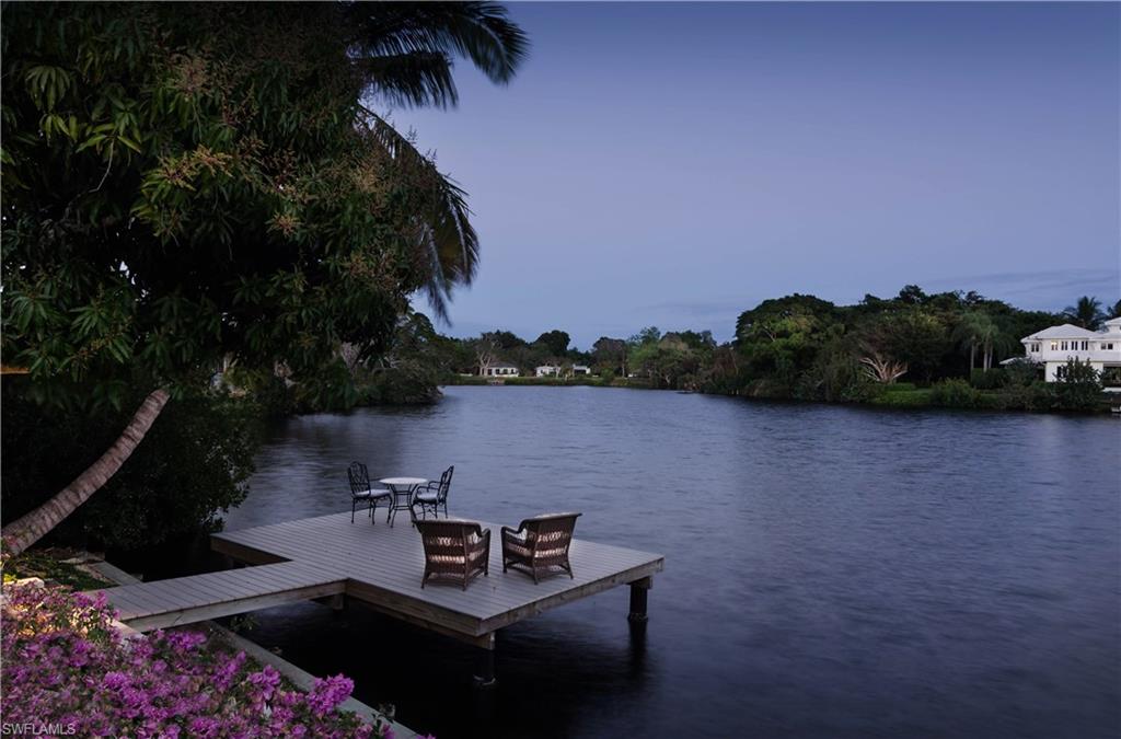 Located 3 homes from the Gulf & sitting upon Reflection Pointe Lake, you will find a home designed to contrast with it's neighbors, Sea Pointe. Built in 2016 & over 5300 sq ft, this 4+bed/5+ bath home was designed by Naples renowned Architect Jonathan Titus. Built to the highest of standards, Sea Pointe blends the flavors of the French, Italian,& Spanish renaissance to create a home with Old World Charm & the modern conveniences of today. French doors beckon you through to the patio where you will find your pool & spa just steps away from the lake. The finest of finishes were used including distressed Bourgogne Clair limestone & antique New French Camargue wood flooring, full arched Old English wooden doors, authentic French hardware, & a beautifully crafted iron staircase, walk & entry gates. The kitchen boasts state of the art appliances-a 6 burner w/ griddle Wolf oven. For dog enthusiasts there is a professional dog run (or can be converted to a putting green for those sans four legged friends!). The first floor lake view master suite includes a private patio and large sitting area.There is even a "peek a boo" view of gulf. One will surely find total serenity in Sea Pointe.