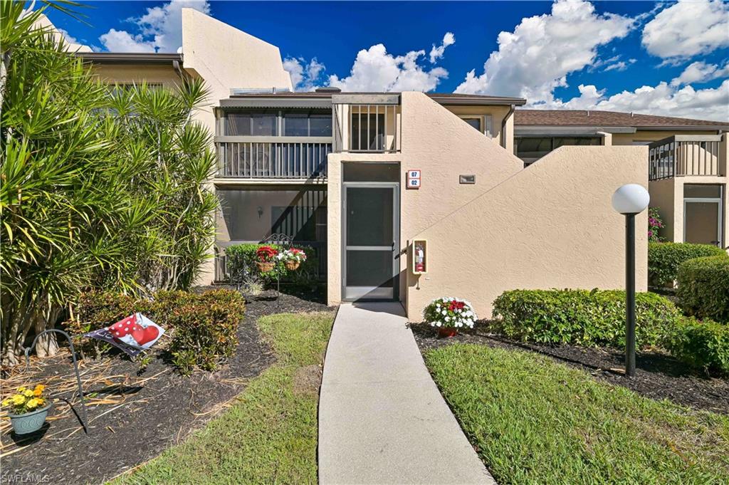 Welcome to this beautifully updated, FIRST FLOOR condominium in the desirable Admiralty Yacht Club, 
a beautifully landscaped, waterfront community. This move-in ready home features 2 spacious 
bedrooms, each with a walk-in-closet, ceiling fan and sliders that open to a private lanai. The 2 fully 
renovated bathrooms each include a tiled walk-in shower, new vanity with quartz countertop and newer 
toilet. The kitchen has been completely remodeled with modern cabinetry, elegant quartz countertops 
and backsplash and a full suite of Whirlpool stainless steel appliances. All appliances are under FULL 
WARRANTY until March 2028, providing peace of mind for the new owner. Additional improvements 
include a new a/c condenser and hot water heater installed in 2023. Enjoy the convenience of 2 
spacious lanais, each with a walk-in storage closet. The rear lanai has new screens and a tranquil view of 
the lake and water fountain, providing the perfect spot to relax and unwind. Admiralty Yacht Club is an 
active, welcoming community with many amenities, including: boat basin with boat slips often available 
for sale or rent, fishing pier, heated community pool with sun deck, pickleball and tennis courts, 
clubhouse (full kitchen, pool table, darts, electronic shuffleboard, games and social gathering space), 
vehicle wash area and bike racks. Whether you’re looking for a full-time residence, seasonal getaway or 
investment opportunity, this beautifully updated, move-in ready condo offers the perfect combination 
of comfort, low-maintenance and waterfront living.
