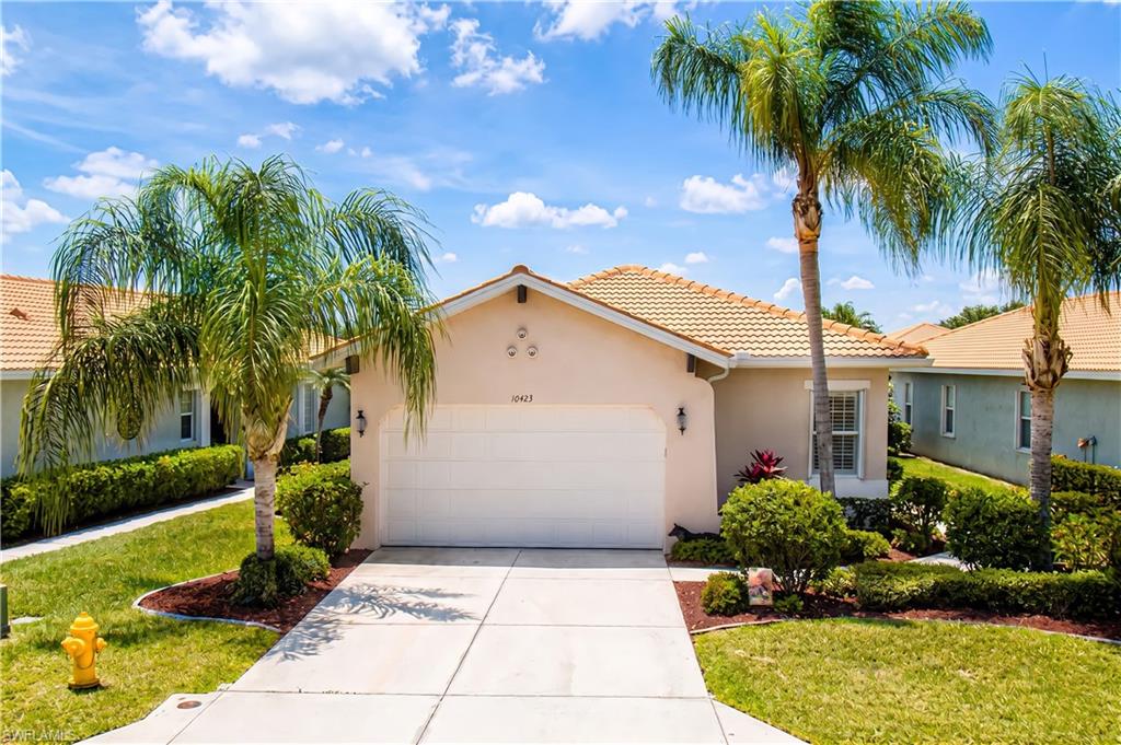 Meticulously maintained and beautifully appointed, this popular Carrara floor plan located in Materita at Pelican Preserve offers 3 bedrooms, 2 baths, and tranquil lake views in one of Fort Myers premier active adult communities. Designed for both comfort and entertaining, the home features granite countertops, custom cabinetry, stainless steel appliances, plantation shutters, and a whole-house water filtration system. 
Step outside to the extended screened lanai where you can relax and unwind in the large hot tub, new in 2025, while enjoying the peaceful waterfront setting. The spacious primary suite includes dual vanities and a walk-in shower with a built-in shower seat for added comfort and convenience. Additional upgrades include accordion and electric storm shutters, a new A/C (2024), and new hot water heater (2024). 
This move-in ready home also includes a golf cart plus some furniture, making your transition effortless. Enjoy the exceptional lifestyle and amenities that Pelican Preserve is known for, including golf, dining, fitness, tennis, pickleball, resort-style pools, and endless social activities. Pelican Preserve is conveniently located close to RSW Airport, shopping & the beaches!