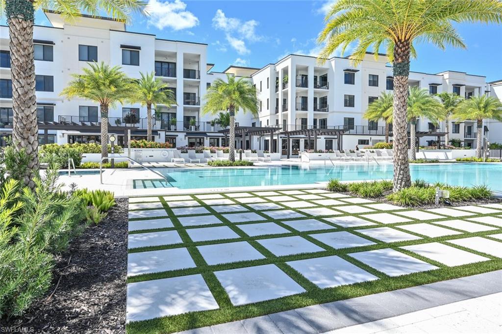 AVAILABLE OFF SEASON 2026 ONLY. This former Model home with 2 bedrooms + den and 2 baths, creates an inviting contemporary space with the natural light you would expect in a Naples coastal retreat. The luxurious primary suite offers a king-size bed and large walk-in shower. The guest bedroom has a queen-size bed for guests with ensuite bath. The den features a full-size sleeper sofa and a custom built-in desk. Entertaining is effortless with the oversized kitchen island and ample seating for family and friends. The living room offers a comfortable couch, 2 side chairs, and a new 65" Class Bravia OLED Smart TV and SONOS. Floor to ceiling glass doors lead out to the lanai with 2 chaise lounges and a table for outside dining. Eleven Eleven Central amenities include an infinity pool, fitness center, social room, game room, movie theater, grilling area, fire pits, cabana bar with TVs, electric car charging stations, putting green, life-size chess board, Bocce, and many planned social events throughout the season. The private shuttle will take you to the Gulf beaches or to 5th Avenue and 3rd Street or the world-class shopping and dining are only about 5 block away! Live exceptionally in Eleven Eleven Central!