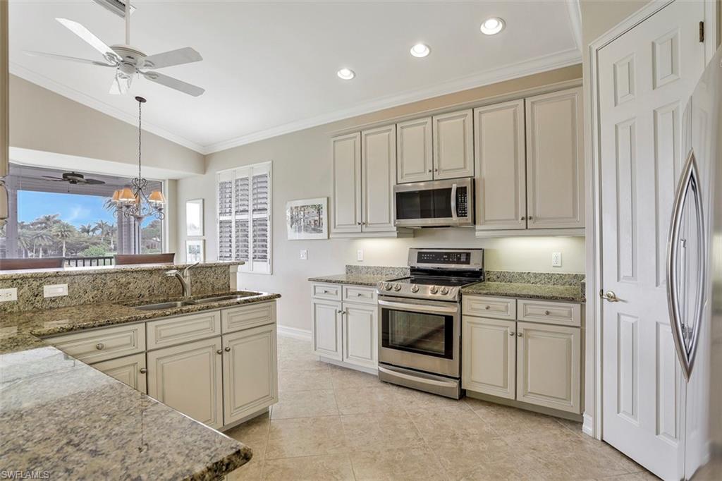 Prepare to be "WOWED" by this exquisitely finished and absolutely BEAUTIFUL Renaissance Carriage Home! With an updated kitchen that exudes charm and style, and private elevator- this upstairs Triana unit is sure to be favored over all others! This home is ideally positioned with the most private preserve view, most enjoyable from your large screened-in lanai. With over 2,800 square-feet of livable space consisting of 3 bedrooms, a den/office, bonus/media room and 2 full bathrooms- there is ample room for hosting friends and family! The Master Suite includes a sitting area, large soaking tub, oversized shower and double walk-in closets. The newly updated kitchen is complete with granite countertops, updated white cabinets and stainless-steel appliances. Other thoughtfully designed features include the diagonally placed tile throughout all the wet areas, crown molding and plantation shutters throughout the entire home!