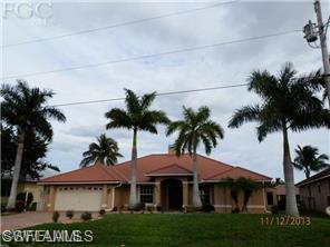 Best price home Gulf Access price per square foot in the area.   Wow, Wow, Wow!!! This completely remodeled 5 bedroom, 3 bathroom home boast a large open floor plan w/ den, formal dining room, formal living room with fireplace and upstairs game room. Home has new diagonal tile throughout, wet bar w/ wine cooler, new carpet, paint inside and out, new light fixtures, cabinetry, appliances, countertops, crown molding, 5.25 baseboards, new pool heater, new pool pump and much more. The pool was resurfaced, and pavers where sealed. A home warranty is included. The pool has large spa. There's a large wrap around boat dock in place with tiki bar on the dock. The roof is metal, but looks like tile. The home has 2 a/c units run great. The master suite offers crown molding, tray lighting, duel sinks and separate shower w/ jet sprayers and huge garden tub. There's also a home propane generator attached. This home is one of a kind and priced to sell w/ the lowest price per sq foot available on the market within miles. Call for your private showing today