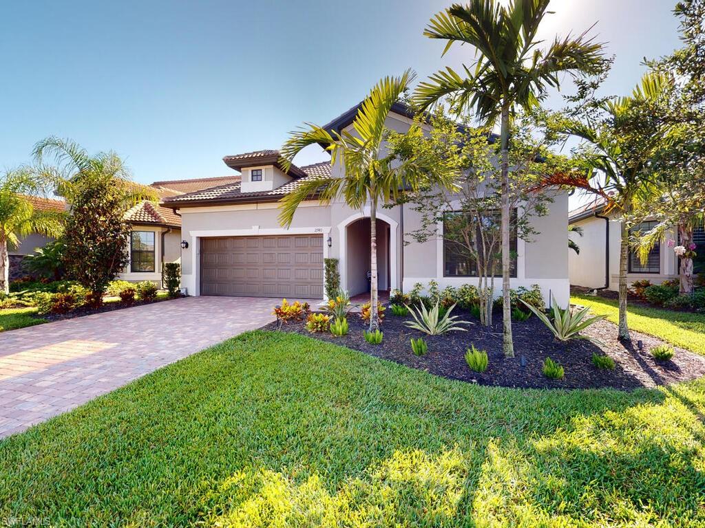 Here’s your opportunity to own in the highly sought after community of Fiddler’s Creek.  Enjoy all southwest Florida has to offer for indoor/outdoor living with this beautiful 2021 Fiddler’s Creek, fully-furnished home. Surrounded by lush landscaping, this home overlooks the lake with a yard and large screened lanai with in-ground heated pool and spa, outdoor kitchen with gas grill, pizza oven, refrigerator and custom lanai lighting with TV.  This home has three bedrooms, two full bathrooms, abundant closet storage with built-in organizers throughout. The kitchen has an oversized, Silestone Quartz countertop island with built in cabinets for additional storage and stainless steel appliances including newer dishwasher, gas range and refrigerator with water and ice maker.  Just off the gathering room is the Primary suite which overlooks the lanai and Lake.  The Primary suite is accented with a tray ceiling, custom closet cabinets and an ensuite with dual sinks and a beautiful walk-in-shower.   Additional amenities include Luxury plank ceramic tile throughout the home, over-sized walk-in pantry off the kitchen, whole-home backup generator (Natural Gas), monitored Ring security system, and all the award-winning Fiddler’s Creek amenities included in community.