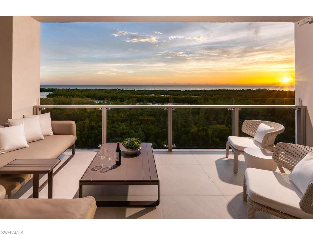 Ultra Luxury Living. Now available 7th floor estate home in the opulent and seductive new construction high-rise Mystique in Pelican Bay. Enter through your private elevator into an open concept floor plan, with clean European oak hardwood floors, paving the way to floor to ceiling windows offering sweeping Gulf of Mexico views. Completely finished and furnished, this gorgeous retreat offers a spacious Master Suite with a seating area overlooking the Gulf; 2 en-suite guest bedrooms; 2 living areas; sleek chef's kitchen design with natural gas; and dining, all wrapped up in a stunning move-in ready home. Two parking spaces with controlled access garage. Enjoy year round sunsets from the balcony. Mystique is the newest luxury high-rise in Naples. Amenities: 24-hour front desk, captivating designer common areas including solarium, library, billiards, theatre, resort style pool, 2 tennis courts and 2 guest suites. Building is pet friendly. Pelican Bay offers a truly compelling list of lifestyle features: 570 acres of estuaries, 43 acres of parks, beachfront facilities and boardwalks, miles of white sandy beaches, beachfront dining, 18 Har-Tru tennis courts and fitness center.