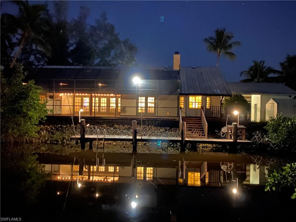 PRICE IMPROVED TO SELL FAST!  ALL REASONABLE OFFERS CONSIDERED! CALLING ALL BOATERS!! 20 MIN DIRECT ACCESS, DEEP WATER CANAL, WITH NO BRIDGES TO GULF OF MEXICO!   ONE OF A KIND, SPECTACULAR 2771 SQ FT  HOME!  RANCHER STYLE ONE LEVEL HOME WITH OPEN SPLIT BEDROOM PLAN! 3 BEDROOMS, 2 BATH/ WITH POWDER ROOM! 13 FT CEILINGS, LARGE OPEN KITCHEN! HUGE MASTER SUITE, WITH HUGE MASTER SHOWER AND JACUZZI !!!  116 ft  DOUBLE WATERFRONT LOT, ON HALDEMAN CREEK! BRAZILIAN “IPE” HARDWOOD CAGED 54’ LANAI, OVERLOOKS THE PRIVATE “IPE” 35’  LIGHTED DOCK, WHICH WILL LAST A LIFETIME!  WATER, ELECTRIC, MOORING WHIPS, FISH CLEANING STATION ON DOCK  FOR ALL OF YOUR FISHING NEEDS!!  EXTREMELY STURDY CAGE, BUILT WITH 2 X 6 CONSTRUCTION WITH INSECT PROOF NO SEEUM SCREEN. 6-8 PERSON JACUZZI HOT TUB ON LANAI!  WOOD BURNING FIREPLACE. STURDY METAL ROOF.  CITY WATER / SEWER. TONS OF STORAGE! GREAT LOCATION  -  IN THE BAYSHORE REVITALIZATION DISTRICT! CLOSE TO CELEBRATION PARK, BOTANICAL GARDENS, TIN CITY, DOWNTOWN, RESTAURANTS, SHOPPING, BEACHES, PLUS SO MUCH MORE!!    YOU MUST SEE THE INSIDE OF THIS HOME!