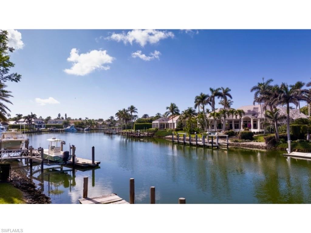 Enjoy beautiful color-filled sunsets from this serene setting on Rum Row overlooking Hidden Bay. Perfect location for a boater. Direct access to Gordon Pass and the Gulf of Mexico or just moments from the inland waterways leading south to the fly fishing estuaries of the magnificent Ten Thousand Islands. The property is being sold in its “As-Is” condition. Port Royal Club membership eligibility.