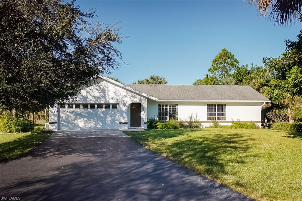 Don't miss this opportunity! Two and a half acres of beautifully maintained yard. Need space for an RV, boat or horse trailer, bring all your toys. This home has a fantastic building that will fit them all. Don't forget your four legged friends! This home also has a great two stall barn with large tack room and storage space. Fully fenced and gated this 2 bedroom, 2 bathroom home has been meticulously maintained. Don't wait, make your appointment to view this home today.