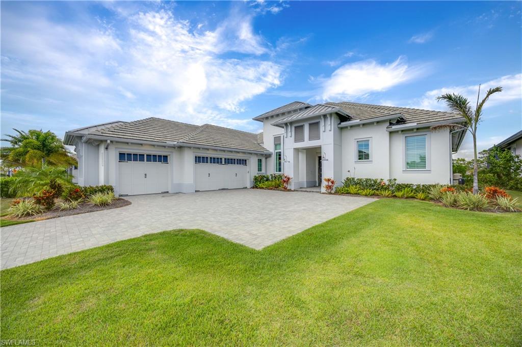 Experience modern coastal luxury at 8781 Santo Domingo Drive, a 2023-built Chandler III estate by Stock Development, perfectly positioned on a private oversized lot with tranquil views of natural water. This is one of the most desirable homes in The Isles of Collier Preserve, offering the ideal blend of privacy, elegance, and turnkey convenience. House has been built up and is Denominated Flood Zone X.

Spanning nearly 3,200 sq. ft. under air, this 4-bedroom + study, 4 bath masterpiece showcases soaring ceilings, open-concept design, and seamless indoor-outdoor living. Walls of glass open to an expansive lanai with resort-style pool and spa, outdoor kitchen, and multiple covered lounging areas—all capturing serene water views and stunning sunsets.

The gourmet kitchen is a chef’s dream, featuring JennAir stainless steel gas appliances, quartz countertops, custom cabinetry, a large center island, walk-in pantry, and adjacent wet bar for effortless entertaining.

The primary suite offers a private sanctuary with panoramic views, luxurious spa bath, dual vanities, soaking tub, glass-enclosed shower, and custom walk-in closets. Three additional ensuite guest bedrooms ensure comfort and privacy for family and guests.

Meticulously curated and offered with designed furniture package as a negotiable item with designer-selected furniture, artwork, rugs, lighting, and décor, creating a truly turnkey experience. Additional upgrades include: Impact-rated windows and doors, Whole-home automation & motorized shades, Designer lighting and custom millwork
Epoxy-finished 3-car garage
Energy-efficient construction with premium finishes throughout

Built in 2023, this home is barely used—ready for immediate occupancy without the wait, stress, or additional expense of building.

Located in The Isles of Collier Preserve, just minutes from Downtown Naples and Gulf beaches, residents enjoy world-class amenities: resort and lap pools, fitness center, tennis and pickleball courts, kayaking, miles of scenic biking and nature trails, and The Overlook Bar & Grill on the water.

8781 Santo Domingo Drive is a rare offering—a 2023-built, fully furnished Chandler III on a private lot with natural water views, combining timeless design, luxury upgrades, and immediate move-in convenience.


Your Naples dream home is ready now—move in and start living the lifestyle you deserve.
