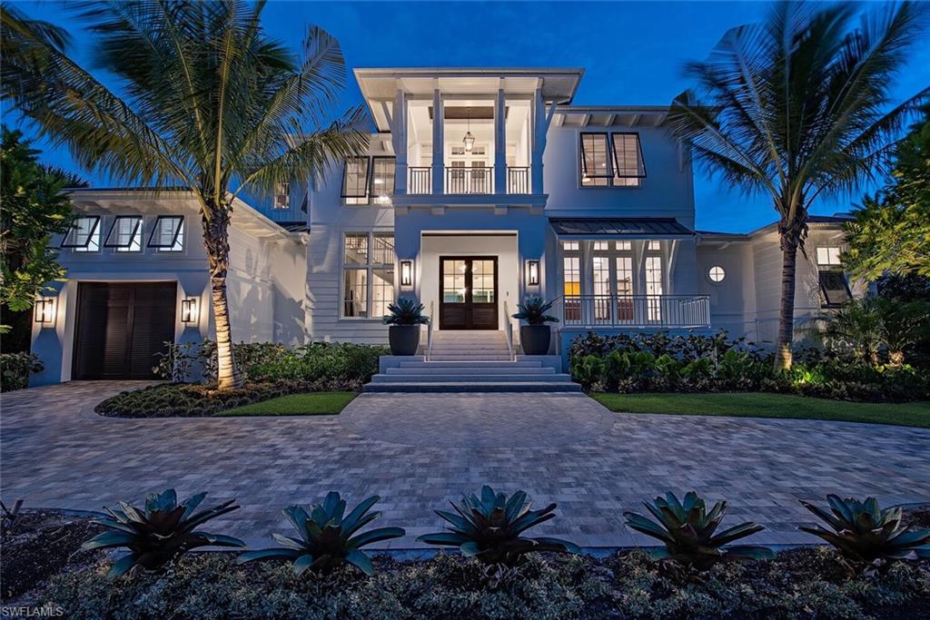 Welcome to an incredible new MHK timeless cottage style home in the perfect Old Naples location.  This extraordinary custom home is situated just 5 parcels from the Gulf and was constructed and sold by renowned developer VIV Homes in 2022. Ideally positioned on an interior lot with preferred southern exposure and rear alley access, this location is just a short stroll to the Naples pristine white sand beaches, shopping, dining, and art galleries along 5th Avenue South and historic 3rd Street South. Residence includes 5 bedrooms + office, nearly 6,400 square feet of air conditioned living space, 7 baths, additional VIP staircase entry, 3 car garage, and an exceptional outdoor living space. Some of the special features include full concrete construction, extensive natural stones throughout, custom cabinetry including Poliform Italian made custom closets, Legno Bastone wood flooring, chef’s kitchen with Subzero/Wolf/Miele appliances, Cristallo Prime quartzite counter tops, service kitchen, natural gas, 48kw generator, Lutron low voltage lighting system, water filtration, Sonos, and security with cameras and water alarm systems. Outside you will find a five star resort like outdoor living space enclosed by automated screens/shutters, fire place, pool bath, heated saltwater infinity edge pool/spa adorned with Tuuci umbrella, fire pit with trellis, and an artificial turf yard. Truly nothing lacks in this very special move in ready opportunity.