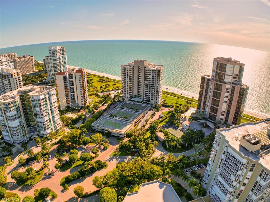 C5335. Enjoy stunning sunsets from this, rarely available, NW-01 unit.  2 Garage spaces, roof top & pool side social rooms with full-service kitchens perfect for hosting special events.  Tennis / pickleball courts, 56 seat theater, billiards room, 24-hour guard, 2 guest suites, & a state-of-the-art fitness center.  Grilling areas beside poolside cabana and tennis courts.  This gorgeous unit is a blank canvas just waiting for your imagination to customize it to your specific taste. Beautiful Gulf views from every room.  Floor plan offers complete privacy for guests.  Contact listing agent for info on the proposed exciting pool deck renovation.