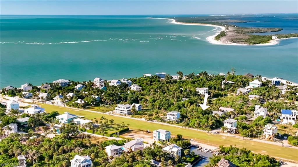 Great Value for a building lot on North Captiva Island! This prime lot is mostly cleared. Located just a short golf cart ride from bay and Gulf beaches, fishing spots, the ferry landing, and local dining.  Water views are possible from the top-floor lookout.  If you are a pilot, this is also close to the airstrip.  The adjacent lot is also listed for sale if you would like to build a family compound or just have some extra space.