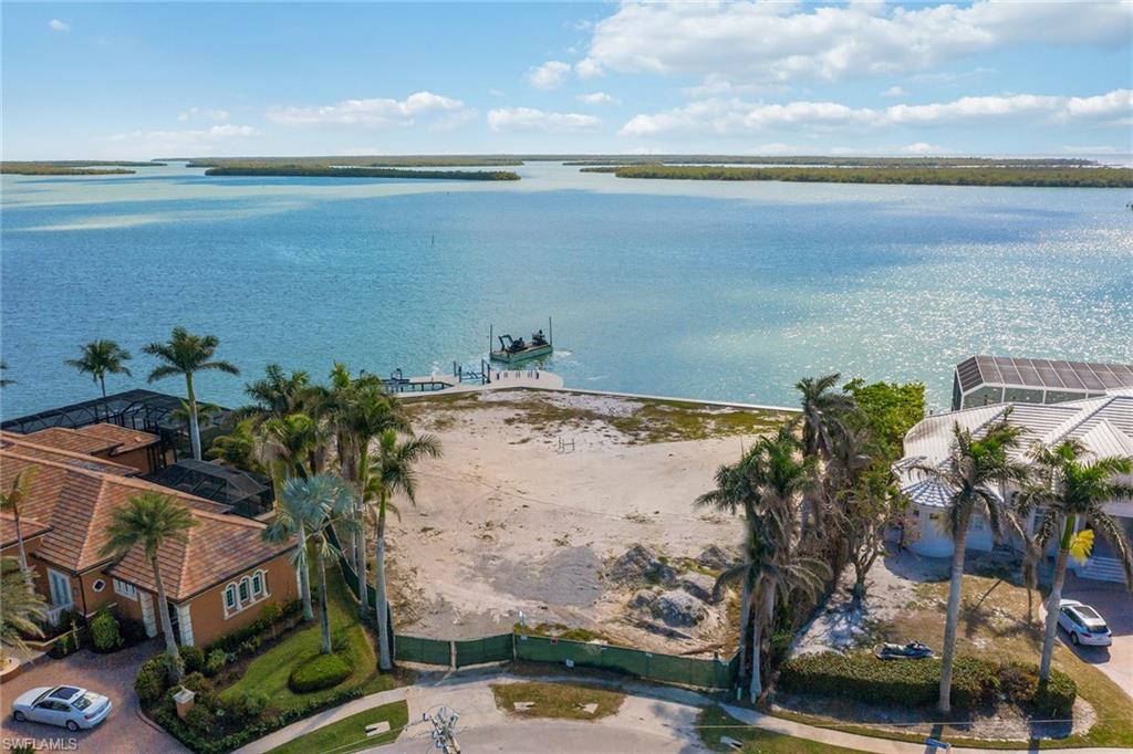 One of the nicest waterfront sites on all of Marco Island. The former home built on this lot was named "Land's End" as it is the southernmost point facing south with endless, beautiful views of the Ten Thousand Islands, Caxambas Pass out to the Gulf of Mexico, mangrove islands, area wildlife and colorful sunrises and sunsets. The 0.79-acre homesite is located in the prestigious estate section and offers 265 feet of direct access water frontage and a new seawall. Owner has home-build plans for an incredible residence.