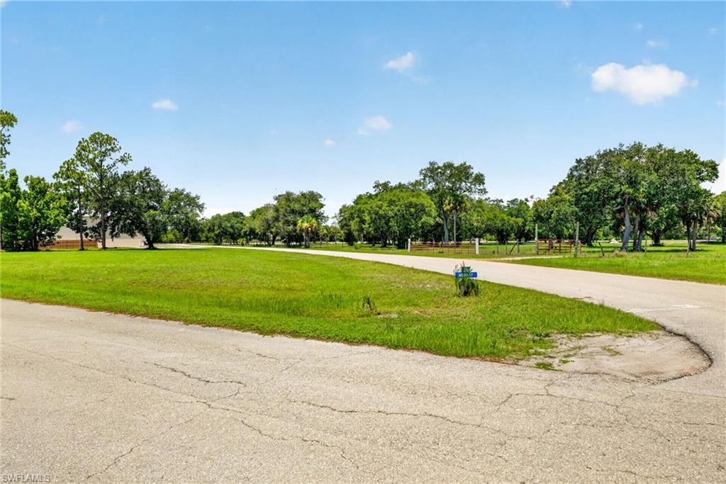 Don't miss this opportunity to own a 0.67-acre corner lot in Buckingham Airpark West, offering direct access to FL59, a 4,500' x 400' lighted concrete runway. This aviation-focused community has experienced remarkable growth in recent years, reflecting its increasing popularity and continued development. The spacious corner lot provides exceptional flexibility to design and build the custom home and aircraft hangar you've always envisioned. The runway is owned and maintained by the Lee County Mosquito Control District, and annual HOA dues are an affordable $300. If you haven't visited Buckingham Airpark West in the past few years, now is the perfect time to see the exciting transformation taking place throughout the community. Own a piece of history, Buckingham Army Airfield was a WW II gunnery training facility. The airfield occupied over 7000 acres and had 6 runways. Imagine stepping from your home into your own private hangar, taxiing a short distance to the runway, and taking off to your next destination whenever the skies call.