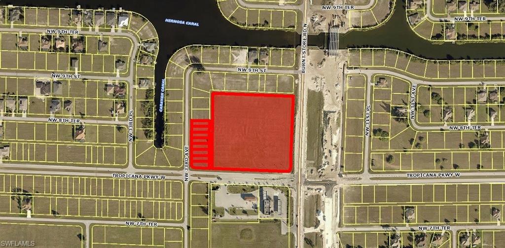 Outstanding development opportunity in growing area.  This 7.75 acre site is one of the few large commercial corners available on Burnt Store Road.  This is a high visibility site with 540' of frontage on Burnt Store Road and 655' on Tropicana Parkway.  The site includes all of Block 4200 A and Block 4200 Lots 1-8 which gives the lot 322' of frontage on NW 33RD Avenue.  Recent road widening including new turn lanes is now complete giving this site excellent access both north and southbound.