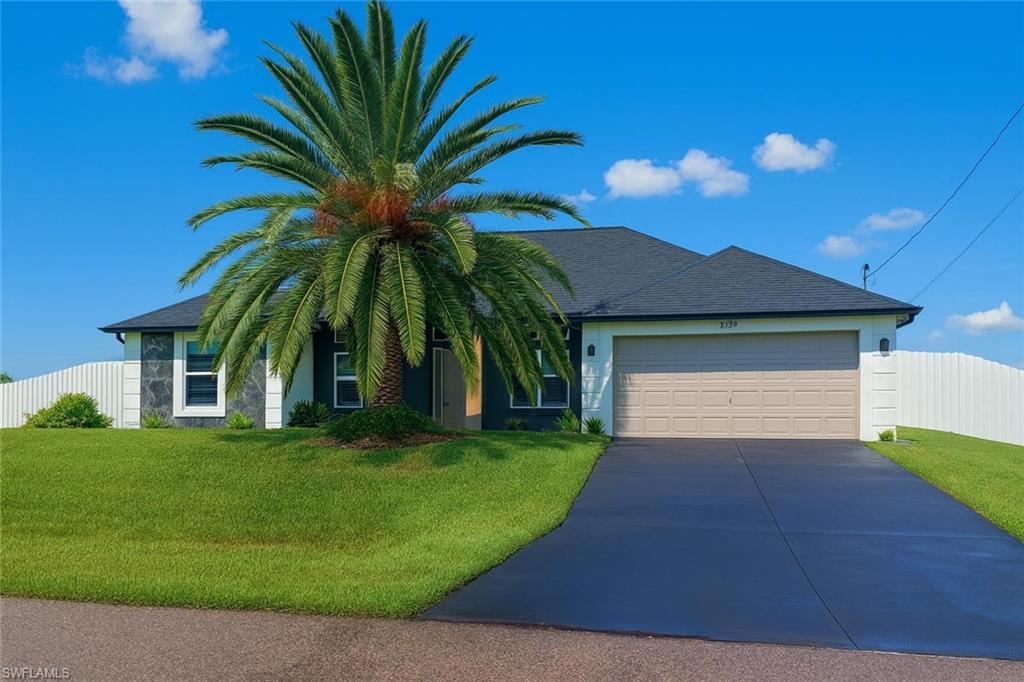 Fully remodeled 4-bedroom + den, 2-bath home located in the desirable Northeast Cape Coral area near Gator Circle. Situated on a rare fully fenced half-acre lot, this spacious residence offers privacy, comfort, and plenty of room to enjoy both indoor and outdoor living.
The open floor plan features stainless steel appliances, an in-residence laundry room with washer and dryer included, generous living areas, and a spacious primary suite with walk-in closets. Custom finishes and thoughtful upgrades throughout the home create a modern and inviting atmosphere, while the elegant exterior design provides excellent curb appeal.
The oversized fenced yard provides abundant outdoor space for relaxation, recreation, and entertaining. Conveniently located near shopping, dining, schools, parks, and major roadways, this move-in-ready home combines space, functionality, and comfort in one exceptional rental opportunity.