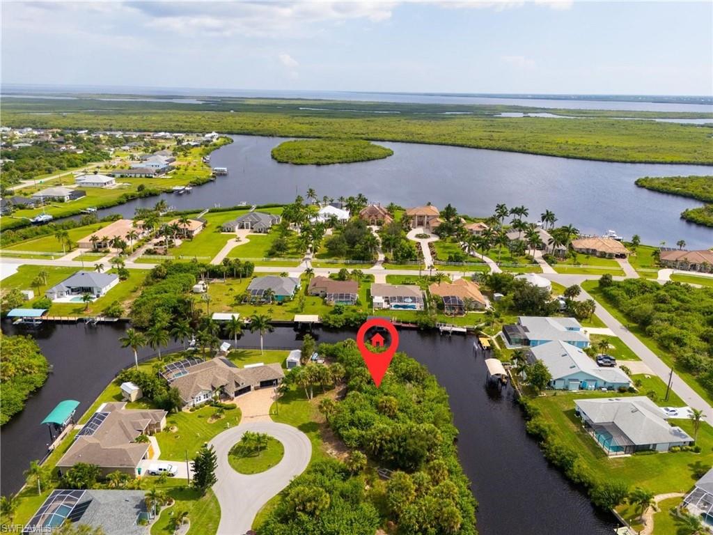 Discover the ultimate waterfront canvas for your dream home with this exceptional TIP LOT! Boasting approximately 225 feet of prime saltwater frontage on 0.39 acres and stunning views of intersecting canals, this property is a true gem. Nestled near the desirable Collinswood Pointe/O Hara Drive area, you'll enjoy the perfect blend of tranquility and convenience. With schools, dining, shopping, and golf all just moments away, this location offers everything you need to create your perfect lifestyle. Don’t miss your chance to own this breathtaking slice of paradise!