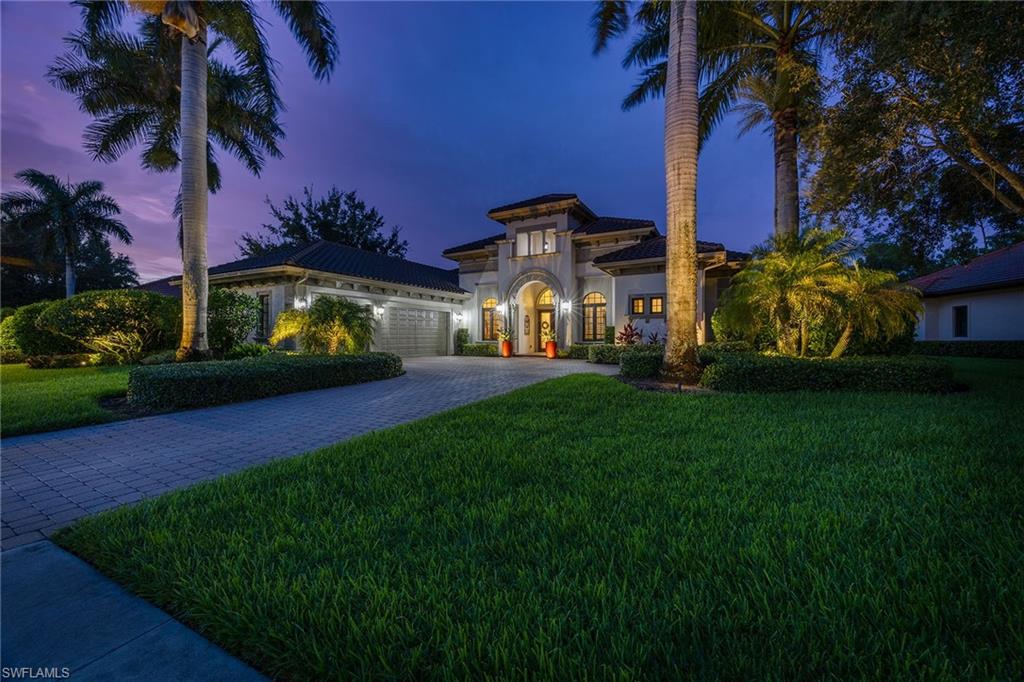 Located within the prestigious guard-gated Classics Plantation Estates at Lely Resort, this extensively updated Muirfield model residence offers privacy, comfort and exceptional indoor-outdoor living. Situated on a premium cul-de-sac street, the property enjoys private golf course and preserve views.  Designed for both everyday living and entertaining, the residence features four bedrooms, a private den, three full baths and one half bath. Thoughtful enhancements throughout include impact-resistant windows and doors, plantation shutters, updated kitchen cabinetry, crown molding, and a climate-controlled three-car garage with custom epoxy flooring.  The expansive screened lanai serves as an extension of the living space, featuring a solar-heated pool and spa, covered seating areas and a summer kitchen equipped for outdoor dining and entertaining.  The renovated gourmet kitchen is appointed with custom wood cabinetry, granite countertops, a walk-in pantry, wine refrigerator and premium GE Monogram stainless steel appliances with a Sub-Zero refrigerator. The open great-room floor plan provides seamless flow between the main living spaces while maintaining privacy for residents and guests.  Additional features include a 2021 roof, electric roll-down hurricane shutters on lanai, generator-ready electrical panel and portable generator capable of powering select areas of the home during outages.  This home comes with immediate membership to The Players Club & Spa, offering resort-style pools, a fitness center, tennis and pickle-ball courts, bocce, multiple dining venues, a tiki bar and grill, theater room, billiards room and full-service spa. Lely Resort is also home to three championship 18-hole golf courses.  Ideally located just minutes from the beaches, dining and shopping of Naples and Marco Island, this residence presents an exceptional opportunity to enjoy one of Southwest Florida's most sought-after resort communities.