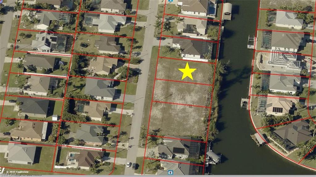 Beautiful canal-front lot offering the perfect opportunity to build your dream home with water access! Surrounded by newly built homes, this neighborhood is rapidly growing and full of potential. Best of all, the property sits outside of a flood zone, making it a smart and secure investment for the future.