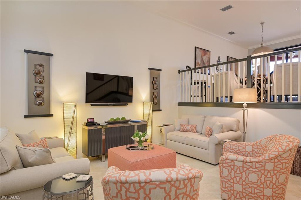 This STUNNING SANTA CRUZ model townhome, located on a quad, has been meticulously maintained! This three bedroom, 2.5 bath home features two large screened and custom tiled balconies, one of them overlooking the quad pool and grill area. The only units on a quad with a coveted rear balcony. With tons of additional custom upgrades above and beyond builder finishes this home is truly impressive. Featuring Crown molding, plantation shutters, tiled kitchen island and backsplash with high end white cabinetry with raised panel ends, ultra violet air handler with LED air quality system. Way too much to list, this is an absolute must see! PASEO VOTED COMMUNITY OF THE YEAR 9 YEARS IN A ROW!! Come relax by the RESORT STYLE POOL or enjoy a beverage at the TIKI BAR. Watch a game at the PUB or enjoy brunch at the BISTRO. Grab a friend and watch a movie in the cinema or work out in the FULLY EQUIPPED GYM. Enjoy a game of doubles on the 6 har tru TENNIS COURTS or join in the fun at the PICKLEBALL COURTS!! Come enjoy the PASEO LIFESTYLE. Visit community website at MyPaseo.Life to tour the fabulous amenities!