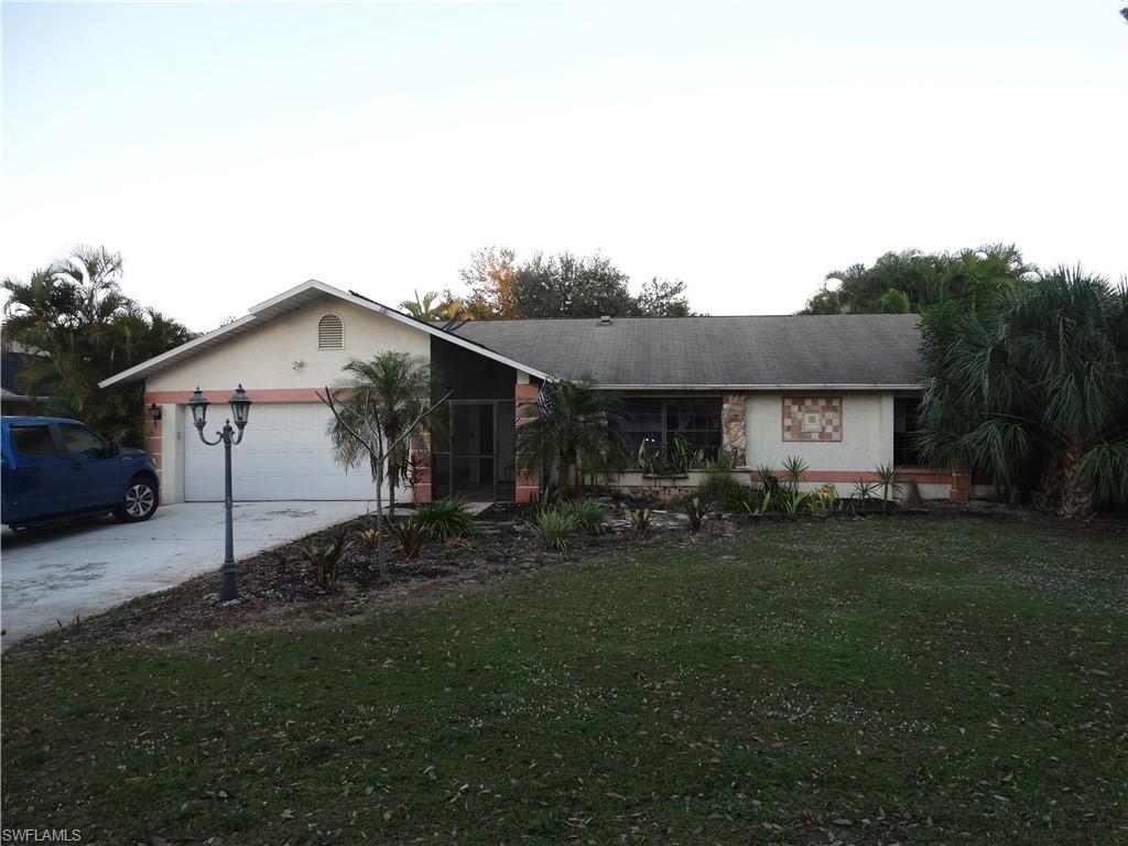 GREAT investment opportunity in an unbeatable location!! This is a 1600 sqft SFH with 2 car garage, has FOUR spacious bedrooms, two bathrooms, and POOL with a huge lanai that is perfect for hosting pool parties/BBQ's/ or entertaining guests. Rear of the house is fenced in, has a nice grassy area for pets (if desired) and is surrounded by large areca palms that provide full privacy. Front yard is large and currently has a small decorative pond and has the potential for beautiful curb appeal. This home sits in the middle of everything, yet is tucked away in a private and charming neighborhood hidden from the hustle and bustle of SWFL and NO HOA! This diamond in the rough is conveniently located minutes from Coconut Point, minutes from Miromar Outlets, minutes from FGCU, the airport, and close to the BEACH! This is a great home in need of TLC and cosmetic updates. A/C is 2 years old, has irrigation capabilities, solar pool equipment.