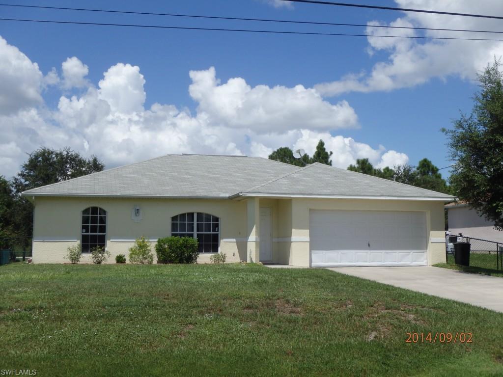 This beautiful home features and open floor plan with wood laminate flooring in living room and all bedrooms.  Large kitchen with corian counter tops and tile back-splash.  Fenced back yard and screened lanai for those fall evenings.  Close proximity to Buckingham Park and Dog Park.  Sellers Motivated.  Show and Sell today!