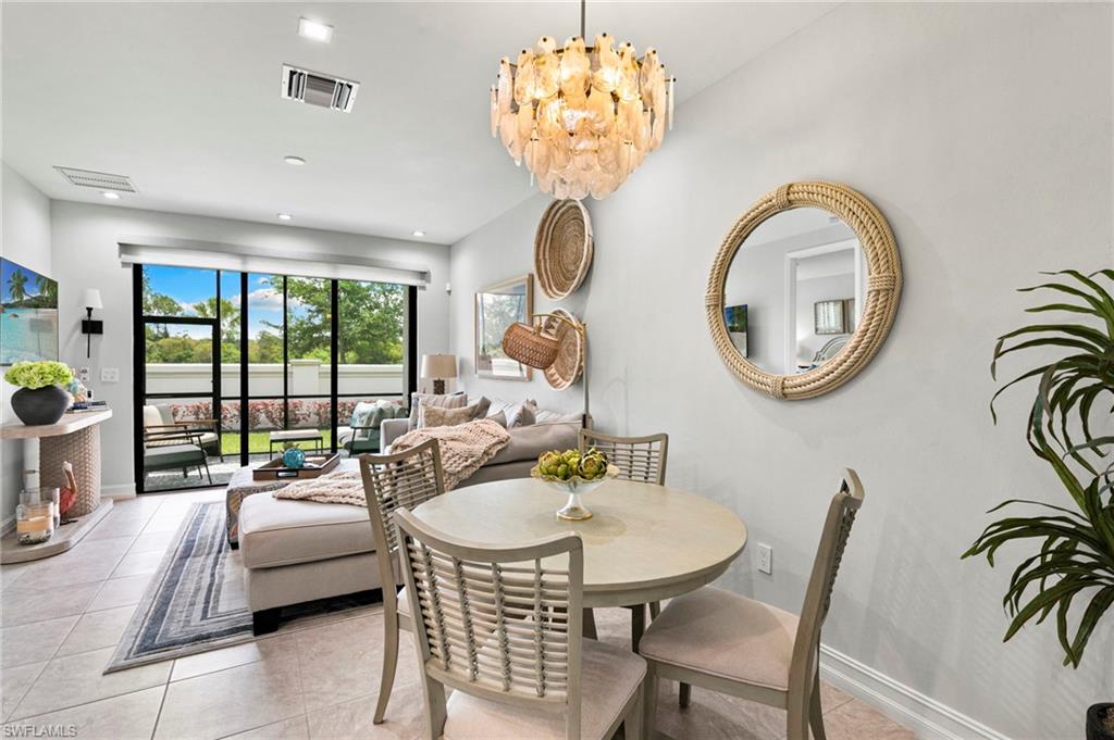 Welcome to this exceptional, meticulously maintained, gently lived-in 3-bedroom, 2.5-bath townhouse in the highly private gated community of Vanderbilt Reserve. Offered in excellent condition and truly move-in ready, this residence combines comfort, convenience, and low-maintenance living. For added convenience, all furniture and décor are negotiable. The thoughtfully designed floor plan features a first-floor primary suite with dual sinks, a spacious walk-in shower, and a frameless glass enclosure. Upstairs, a generous loft provides flexible living space ideal for a home office, media room, children's play area, or additional family room. Upgrades include custom plantation shutters throughout, impact-resistant windows and doors, enhanced lighting, upgraded flooring, ceiling fans, a screened lanai, and an attached 2-car garage. Perfectly situated in desirable North Naples, this home is located within a top-rated school district and is just a short walk to restaurants, grocery stores, salons, and everyday conveniences. Residents enjoy low HOA fees that include cable, Wi-Fi, and roof maintenance. Ideally located approximately 25 minutes from Southwest Florida International Airport, 25 minutes from Fifth Avenue South, and just 12 minutes from Mercato and Naples' beautiful Gulf beaches. Whether you're searching for a primary residence, seasonal retreat, or investment opportunity, this home checks all the boxes. Schedule your private showing today!