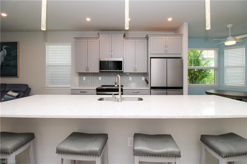 ***BEAUTIFUL ANNUAL RENTAL***NOW AVAILABLE***NEWER CONSTRUCTION***Welcome to this beautiful residence in the highly sought-after Arboretum community, ideally located in the heart of Naples' vibrant Bayshore Arts District. This well-appointed home offers modern finishes, an open-concept floor plan, and access to resort-style amenities, all just minutes from downtown Naples and the Gulf beaches.

The spacious interior features a bright and inviting living area, a designer kitchen with quartz countertops, stainless steel appliances, and a large center island perfect for entertaining. The primary suite offers a private retreat with a walk-in closet and an en-suite bathroom, while the additional bedroom and bath provide comfortable accommodations for guests or a home office.

Enjoy Florida living from the screened lanai overlooking the beautifully maintained community grounds. Additional features include in-unit laundry, an attached garage, impact-resistant windows and doors, and contemporary finishes throughout. Similar Arboretum coach homes feature approximately 1,341 square feet of living space with 2 bedrooms, 2 bathrooms, and a 1-car garage.

Community Amenities Include:

Resort-style pool and spa
Fitness center
Clubhouse and cabanas
Walking paths and sidewalks
Gated community
BBQ and picnic areas
Pet-friendly environment (subject to approval)

Conveniently located near Naples Botanical Garden, Celebration Park, downtown Naples, 5th Avenue South, world-class dining, shopping, entertainment, and the beautiful Gulf beaches.

***FIRST, LAST & SECURITY DUE PRIOR TO MOVE IN***