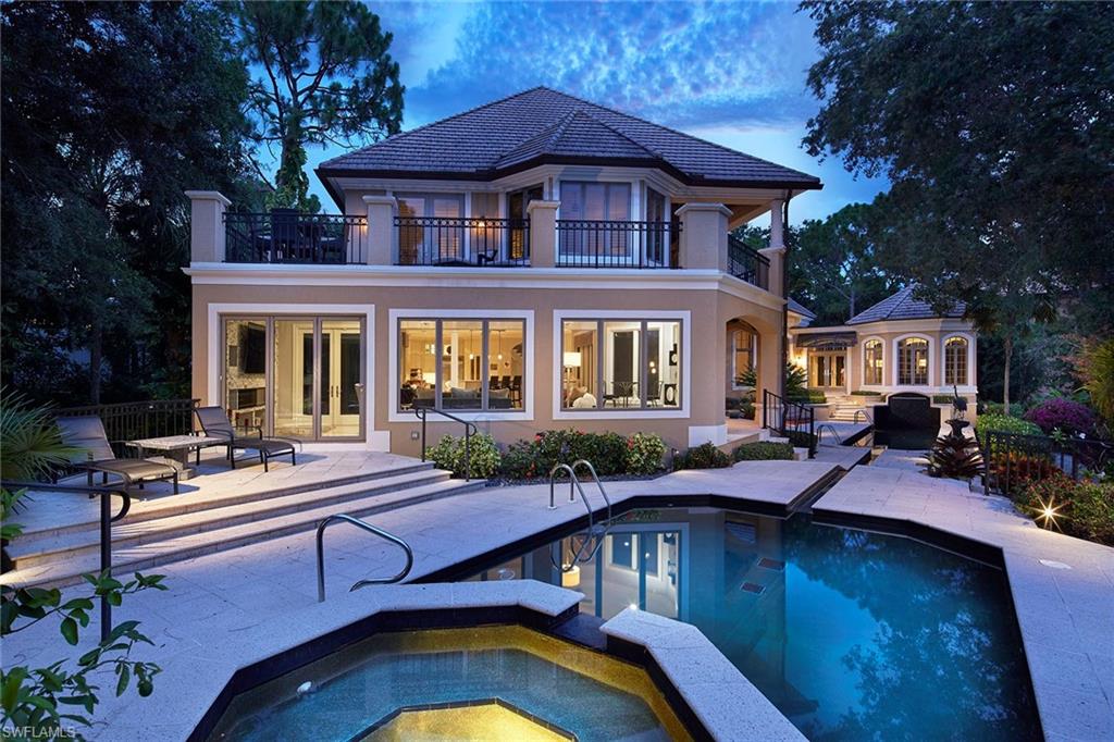 This is the most spectacular home in Bay Creek/Pelican Landing! Watch the manatees, dolphins, bald eagles and great blue heron from your Gulf access oasis. Nature and privacy surround you as you enter this magical estate, which features an open chef's kitchen with a newly renovated great room that captures the grand creek views. Enjoy kayaking or paddle boarding from your backyard right out to the Gulf of Mexico. This home offers 3 bedrooms, den, office, game room with entertainment bar and storage room, wine cellar, ELEVATOR, and 4-car garage with generous storage spaces. Separate guest cabana with a full kitchen, bathroom and sitting area. 2 adjoining pools for swimming and pleasure, amazing outdoor terrace, summer kitchen, and full pool bath. Take in breathtaking views from your picturesque windows while you relax in your master suite reading room. Many more features to explore! This hidden gem checks all the boxes for entertaining family & friends. Welcome home and let us spoil you upon your arrival. Ideally located west of US 41, Pelican Landing amenities include a 34-acre private beach park, tennis, bocce, pickleball, canoe & kayak, a fitness center and a private golf club.