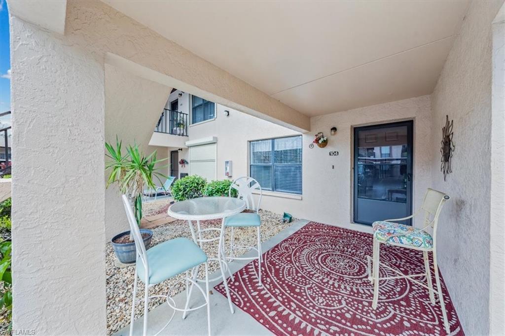 C13806 MOTIVATED SELLER!  This beautifully updated floor turn key furnished end unit has a lot to offer.  Very light and bright throughout the whole home.  Updates include, new kitchen soft close cabinets, backsplash, counter top, sink, under cabinet LED lighting, garbage disposal, dishwasher and AC installed in 2021.   Newer luxury vinyl and horizontal blinds in living area, tile in bathrooms and newer carpet in bedrooms.  Guest bedroom has a unique Murphy queen chest bed.  Primary bedroom has a queen size bed and a LED brushed nickel ceiling fan with light and remote control.  Lanai overlooks landscaped area and pool with a large storage closet, ceiling fan and manual storm shutters.