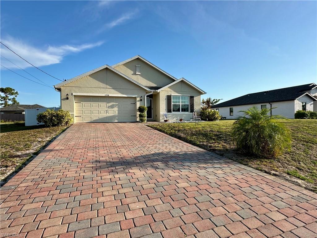 Welcome to this exceptional property located in the Cape Coral area, offering the perfect combination of comfort, style, and modern upgrades. This beautifully maintained 4-bedroom, 2-bathroom home features custom lanai shutters that provide both privacy and protection, along with a smart home system that allows you to control lights, music, and more with the touch of a button.

The property also offers a fully fenced yard for added security and peace of mind. The outdoor space is enhanced by mature fruit trees that create a serene tropical atmosphere, as well as a spacious outdoor living area designed for entertainment and relaxation, featuring a spectacular gazebo and a luxurious jacuzzi, perfect for enjoying the Florida lifestyle year-round.

Whether you are looking for a primary residence, vacation home, or investment property, this is an opportunity you do not want to miss.

Ask about available lender incentives toward buyer closing costs through select loan programs. Subject to lender approval and borrower qualification.