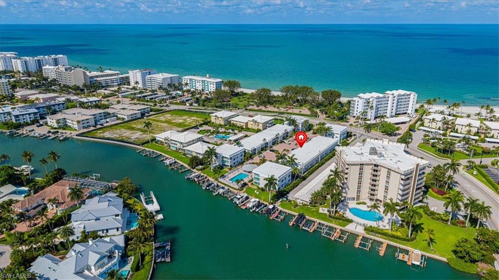 Boat slip available for purchase from seller. Bright, airy, and filled with natural light, this Naples beach retreat offers the perfect blend of coastal charm and convenience. Stroll across the street to the private Moorings Beach Club, or relax at the community's waterfront pool overlooking Hurricane Harbor, where boats glide by and marine life is often on display.
Welcome to Port Au Villa, where the relaxed elegance of Naples beach living is just steps from your door. This impeccably remodeled residence captures the essence of coastal living, featuring thoughtful updates and a light, inviting interior.
Enjoy effortless access to the beach, the highly anticipated Four Seasons Resort Naples Beach Club, and Naples' renowned dining, shopping, and entertainment destinations. The intimate waterfront community is ideal as a full-time residence, seasonal retreat, or investment property, with favorable rental policies providing exceptional flexibility.
Whether you're seeking tranquil days by the water, breathtaking sunsets, or the vibrant Naples lifestyle, Port Au Villa offers a rare opportunity to own in one of Naples' most desirable coastal locations.