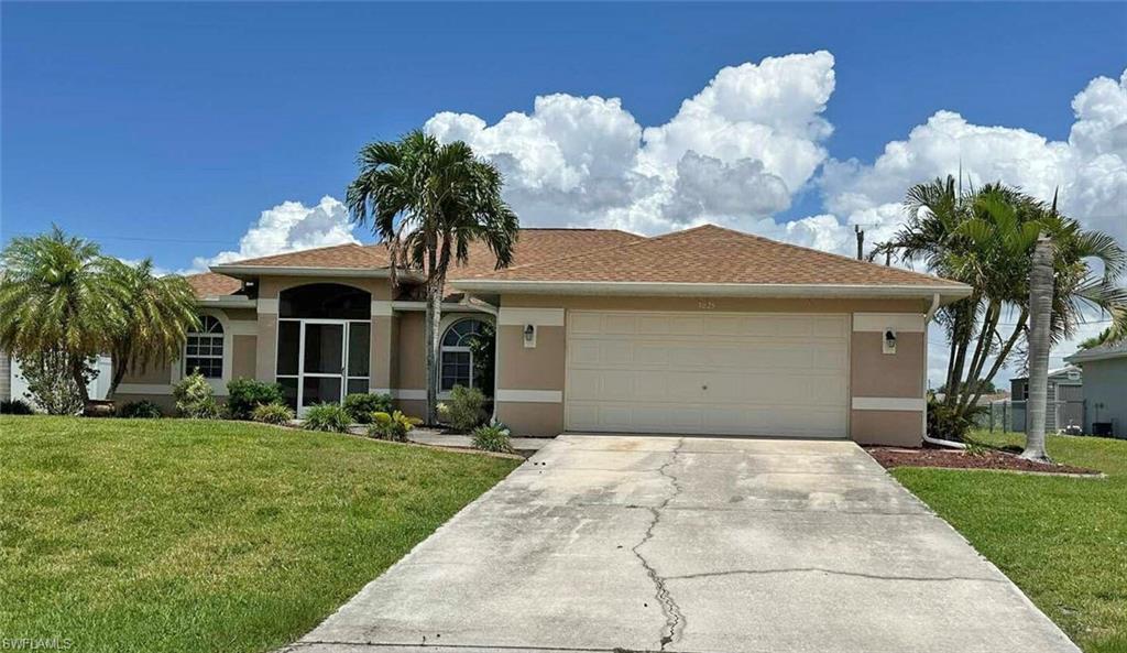 New roof in 2022! Popular open floor plan with 3 bedrooms and a den.  2 baths.  All tiled floors.  Shows well!.  Tucked back in a community off of Santa Barbara Blvd.  Water and Sewer installed - very low assessment balance.  In an X Flood zone.